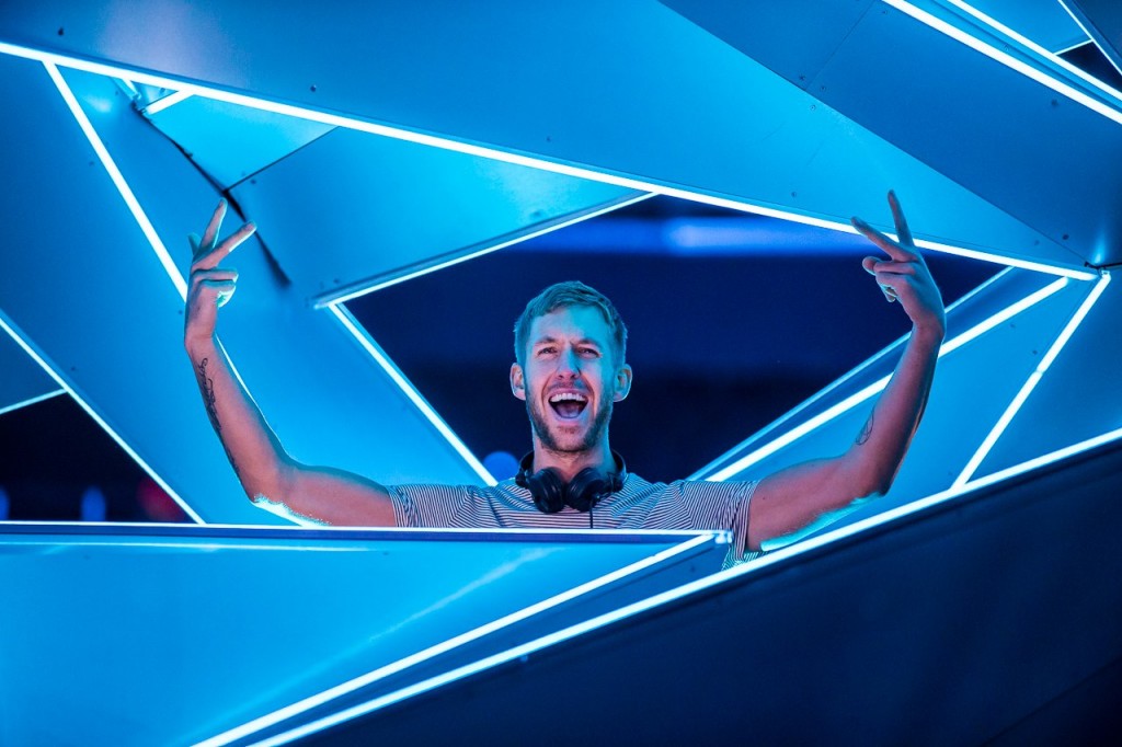 calvin harris arms wide smiling