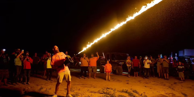 48 people charged, man has his throat slit, & more at 'Redneck Rave' in 48 people charged, man has his throat slit, & more at 'Redneck Rave' in